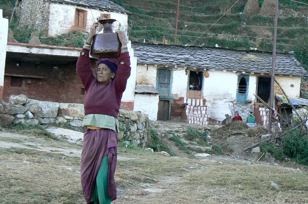 In the Himalayas, most women have to walk miles on hilly terrain to fetch water as local water sources are depleting